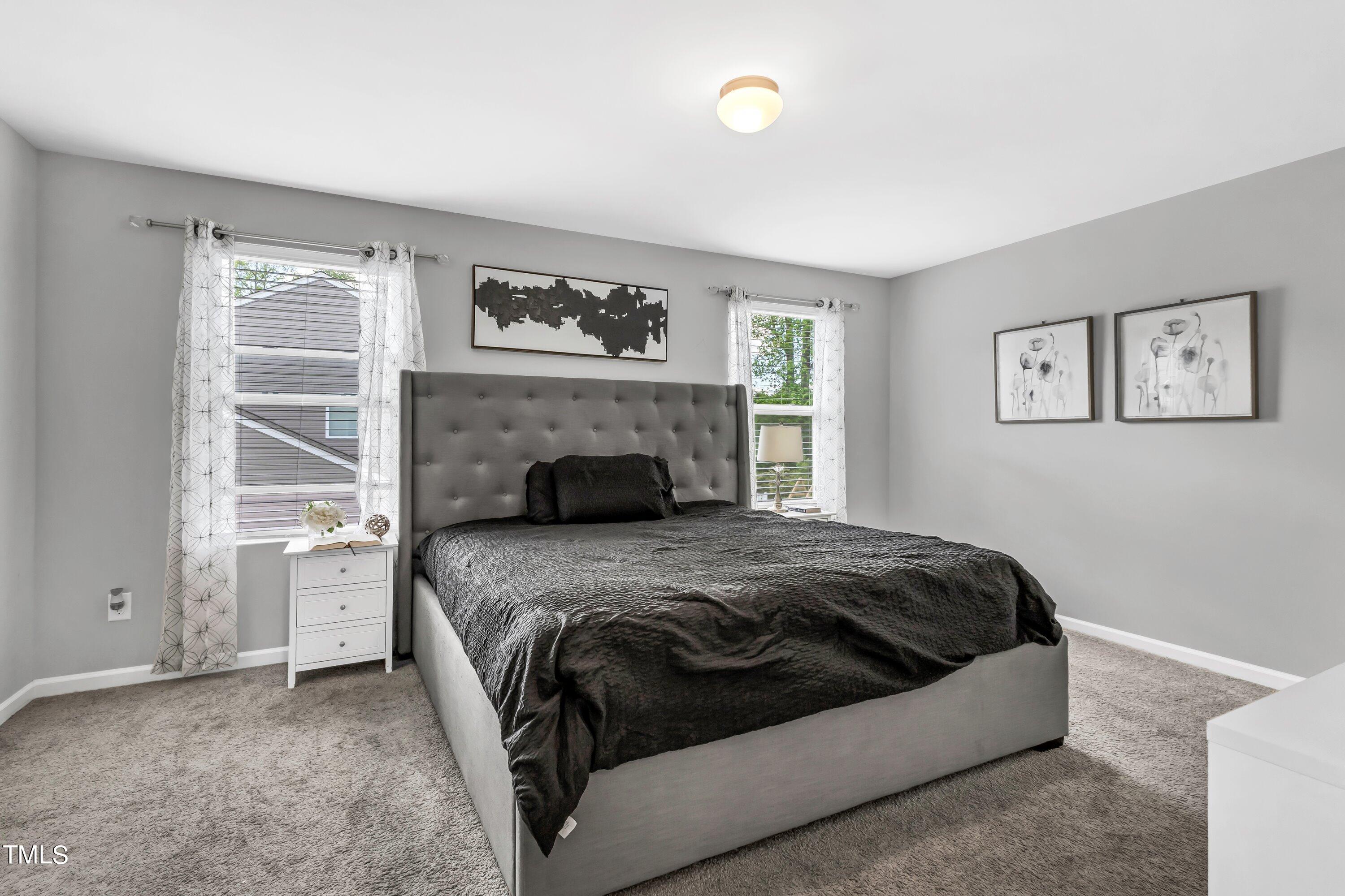301 Connect Drive Wendell, NC 27591 - Photo 18 of 28 a bedroom with a bed and a window