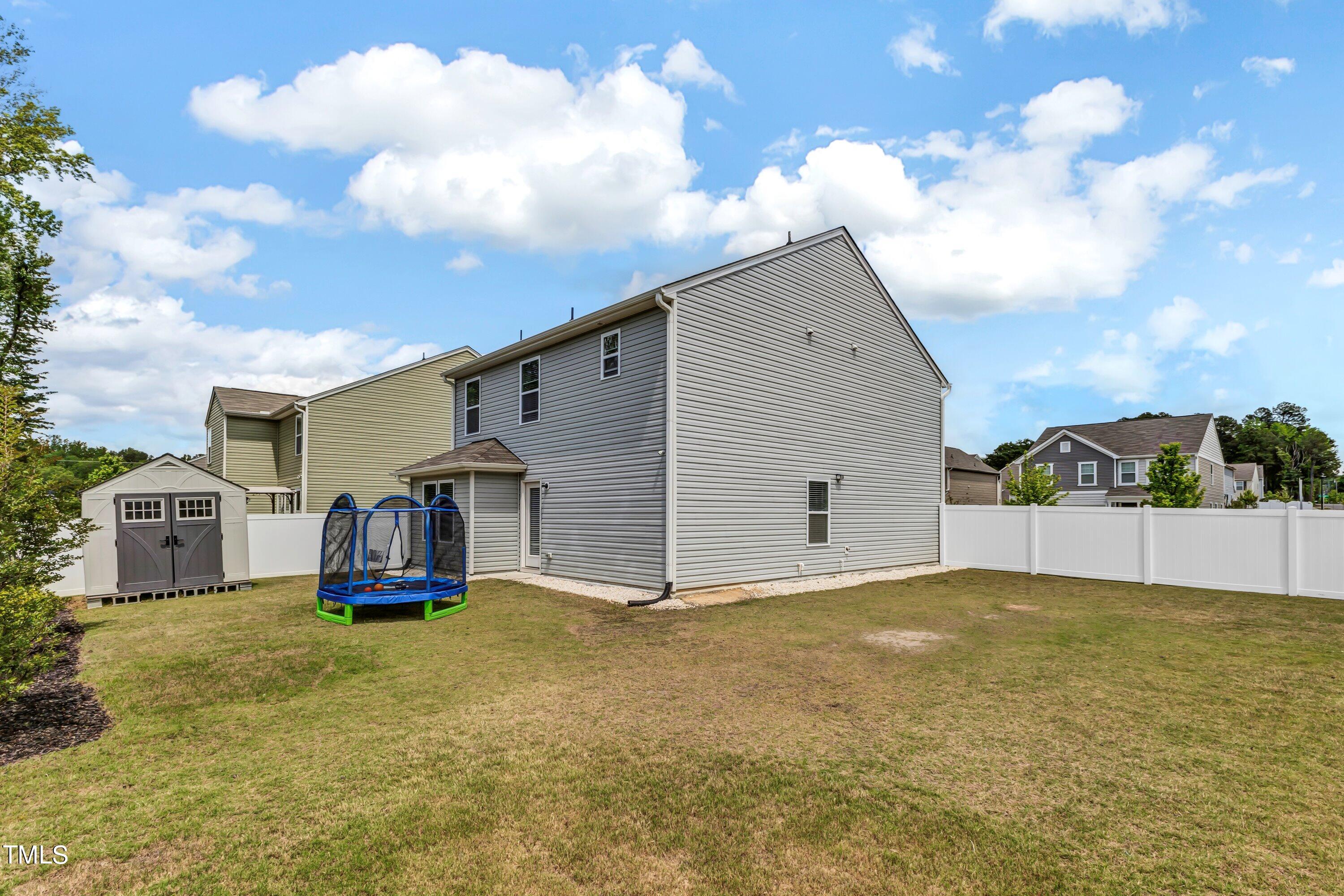 301 Connect Drive Wendell, NC 27591 - Photo 26 of 28 a view of a house with backyard