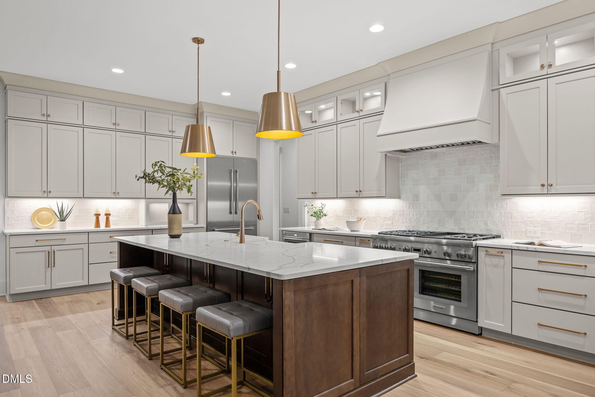 1318 Ivy Lane Raleigh, NC 27609 - Photo 9 of 61 a kitchen with a stove a sink and cabinets