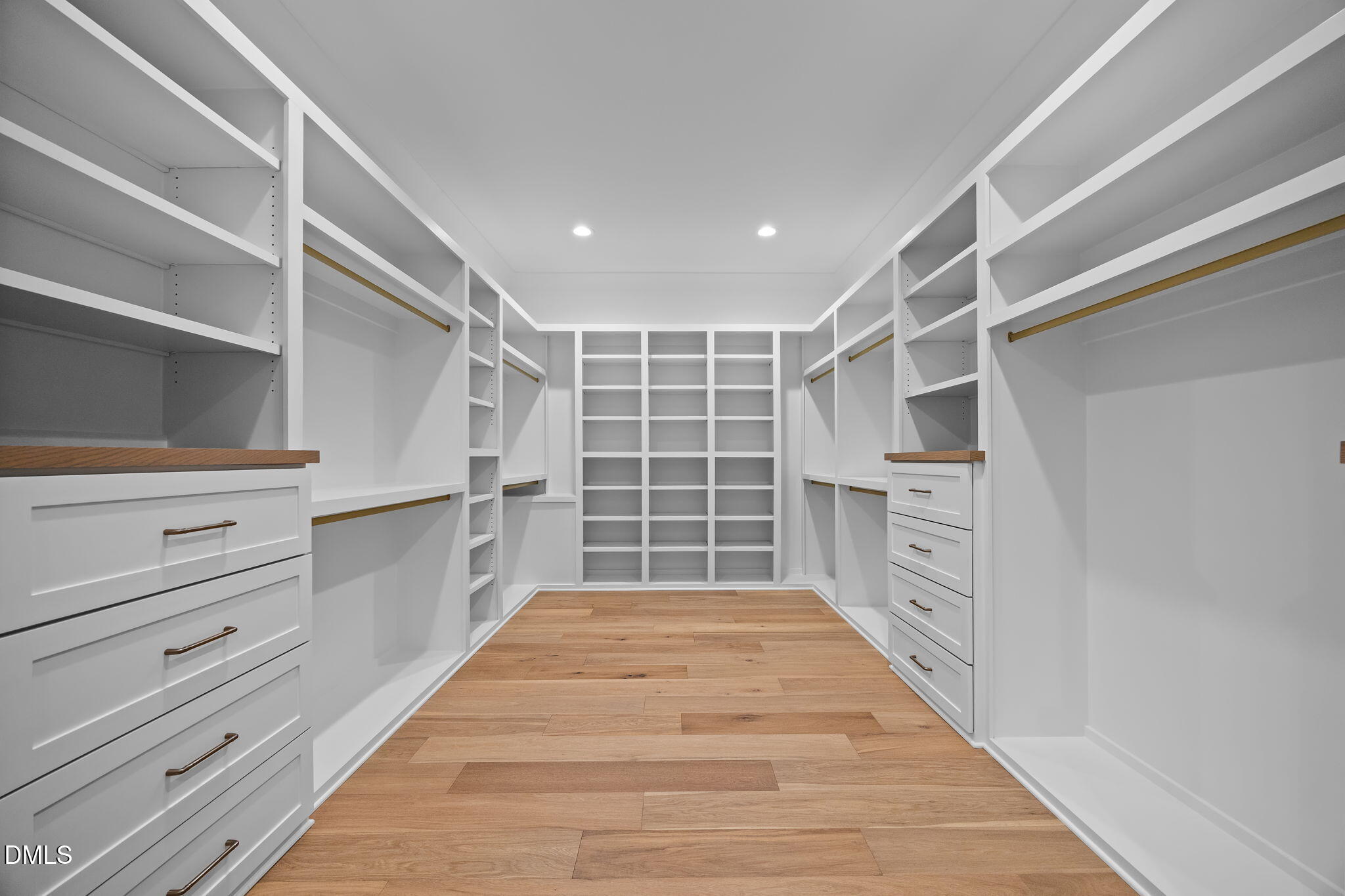 1318 Ivy Lane Raleigh, NC 27609 - Photo 26 of 61 a hallway with cabinets and a window
