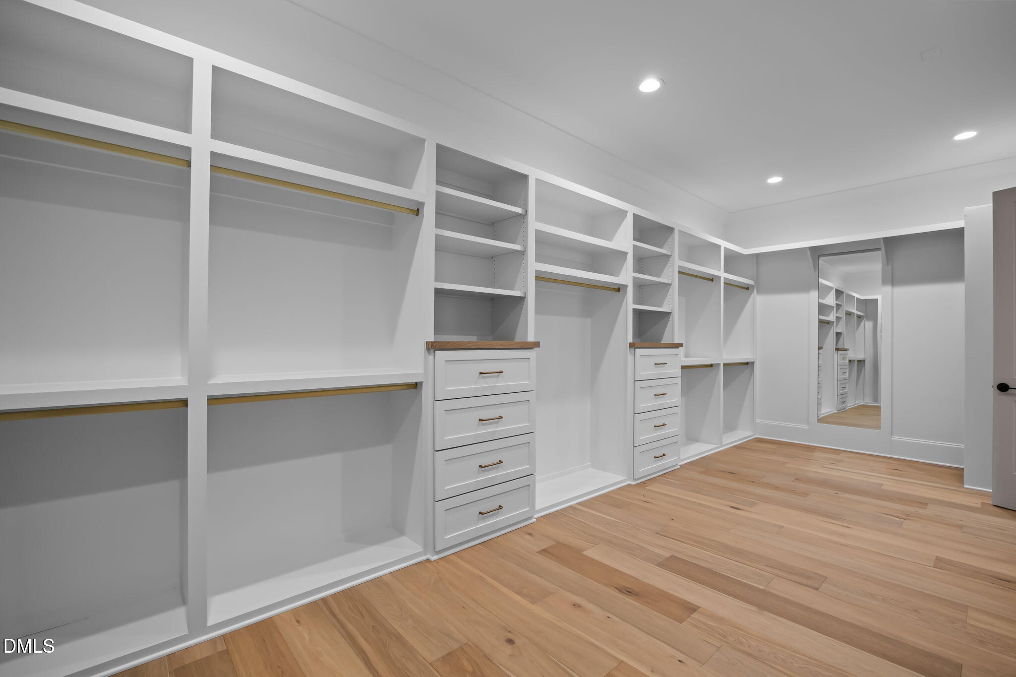 1318 Ivy Lane Raleigh, NC 27609 - Photo 27 of 61 a view of an empty walk in closet