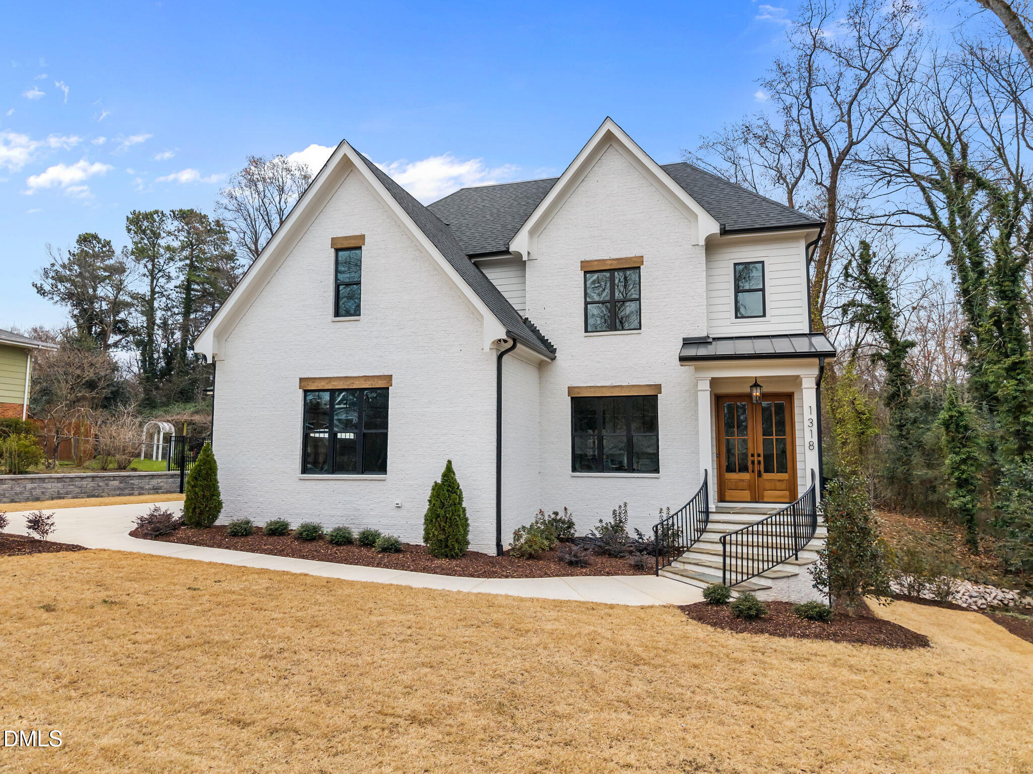 1318 Ivy Lane Raleigh, NC 27609 - Photo 2 of 61 7-web-or-mls-DJI_20251223103823_0708_D