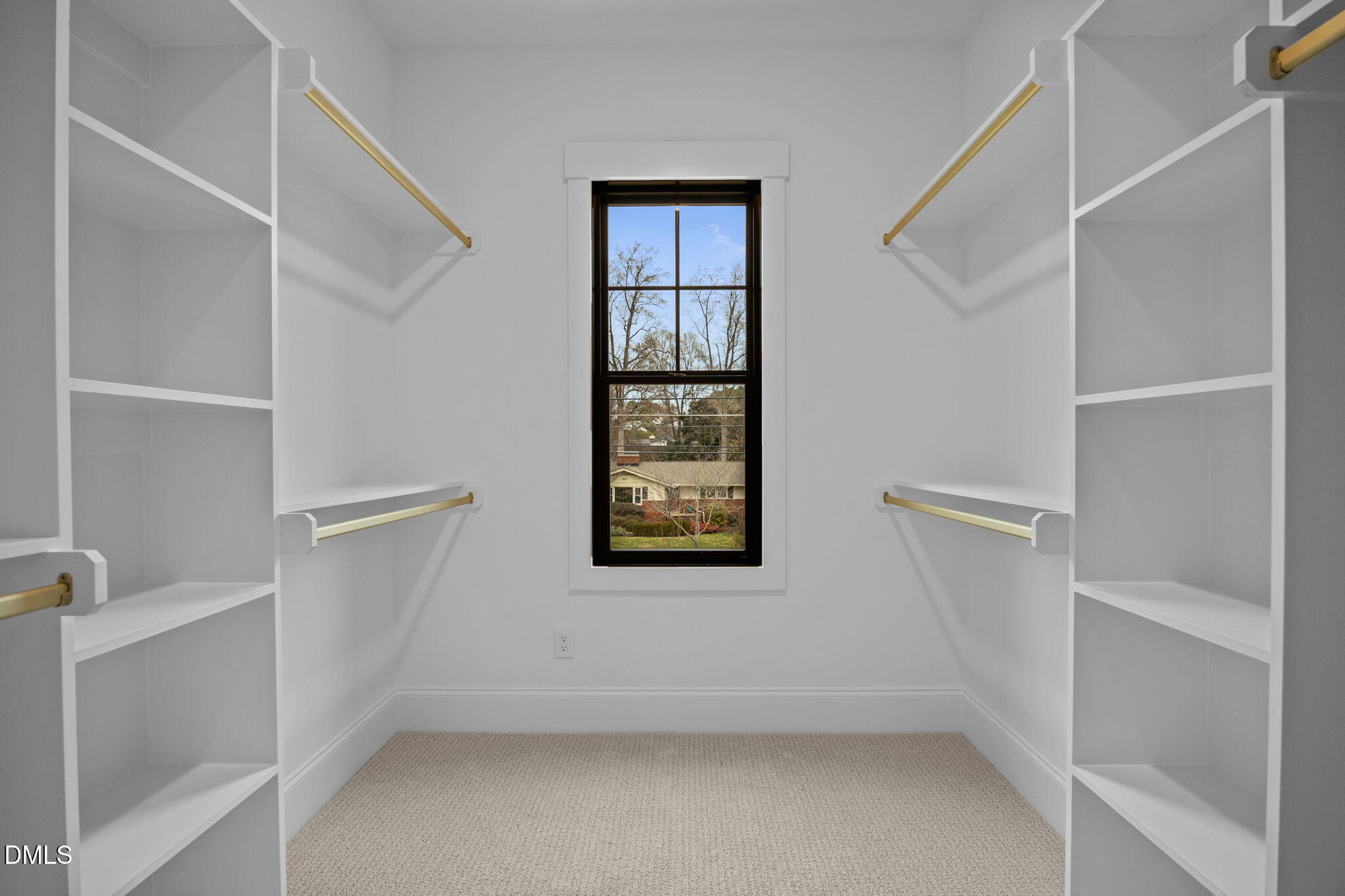 1318 Ivy Lane Raleigh, NC 27609 - Photo 33 of 61 a view of an empty walk in closet