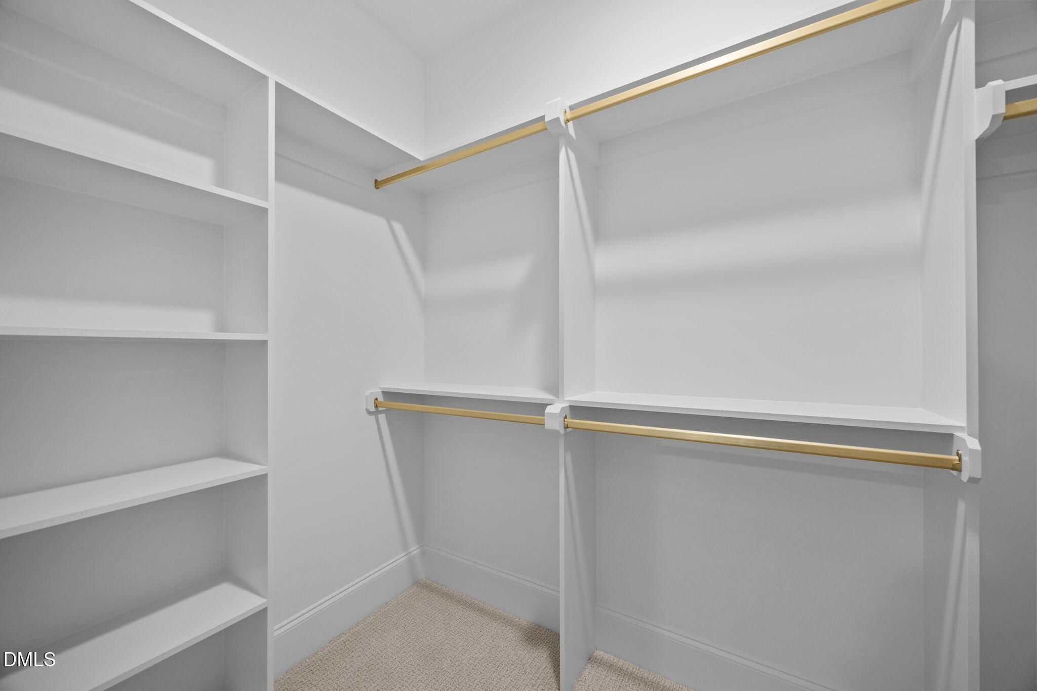 1318 Ivy Lane Raleigh, NC 27609 - Photo 36 of 61 a view of an empty walk in closet