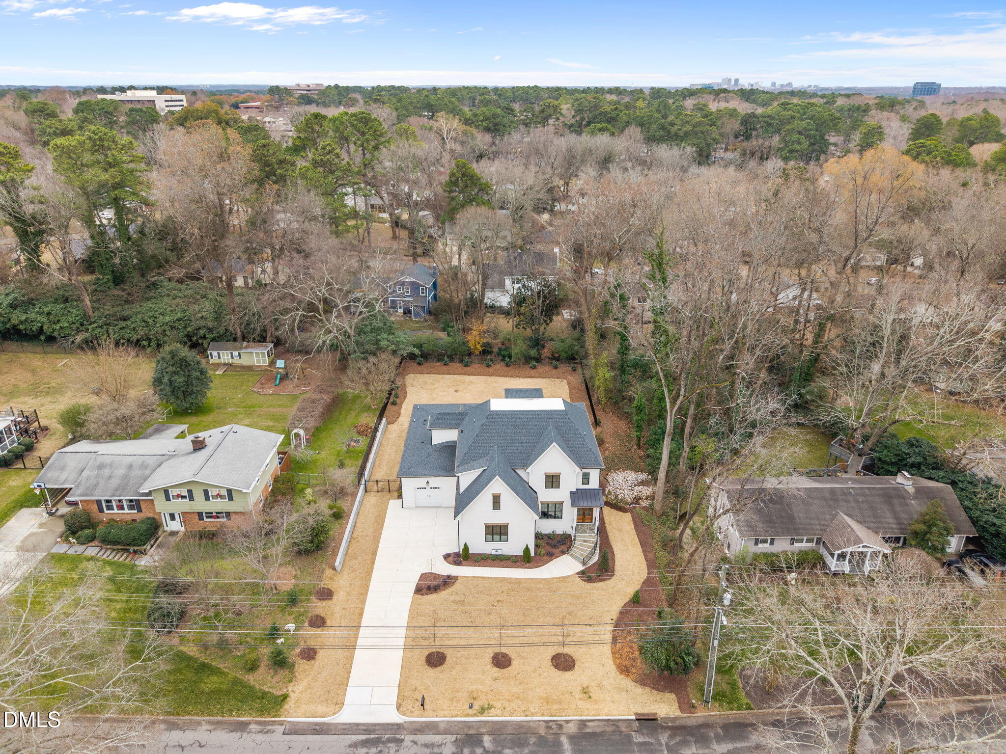 1318 Ivy Lane Raleigh, NC 27609 - Photo 56 of 61 a view of a lake with a mountain view