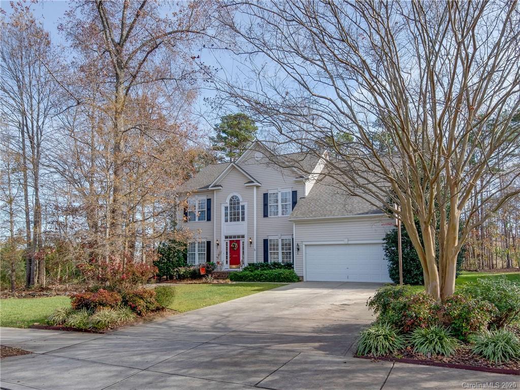 3028 Strawberry Road Matthews, NC 28104 - Photo 2 of 44 a front view of house with yard and green space