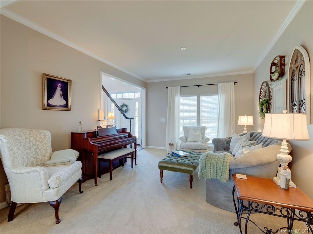 3028 Strawberry Road Matthews, NC 28104 - Photo 17 of 44 a living room with furniture and a large window