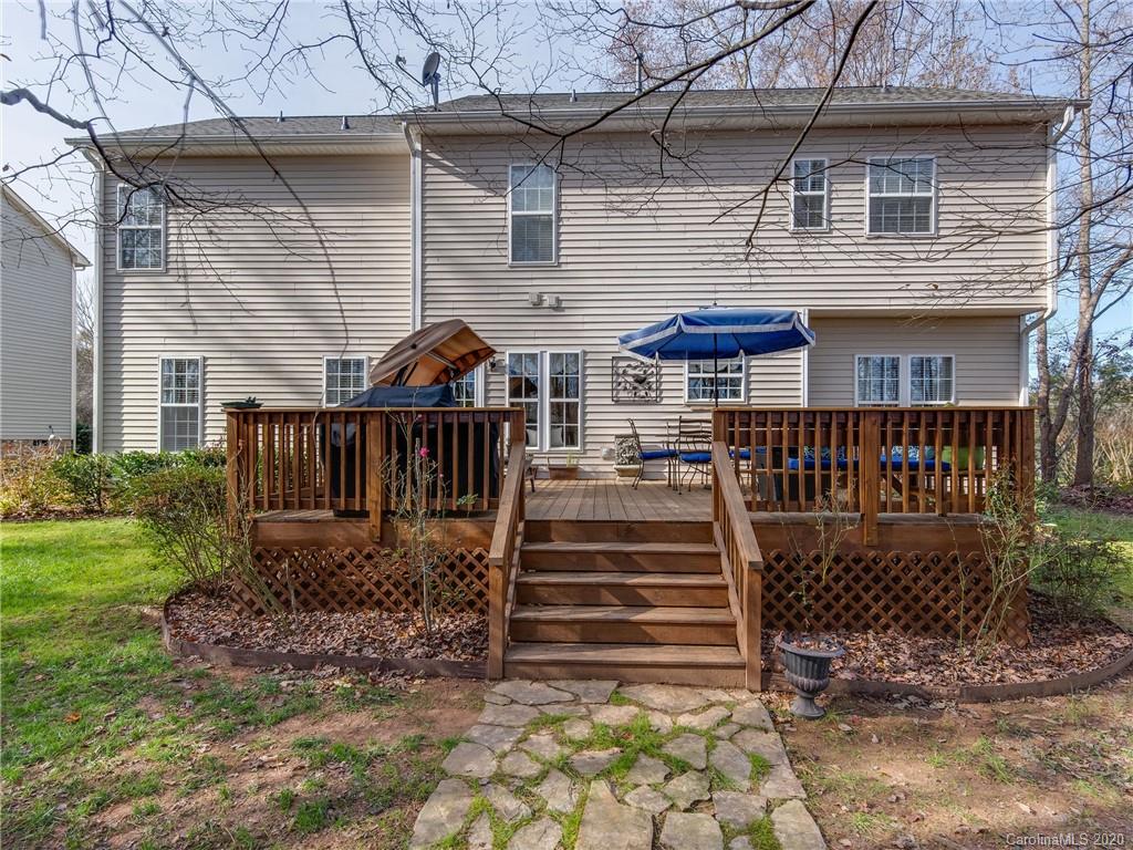 3028 Strawberry Road Matthews, NC 28104 - Photo 36 of 44 a front view of a house with a yard