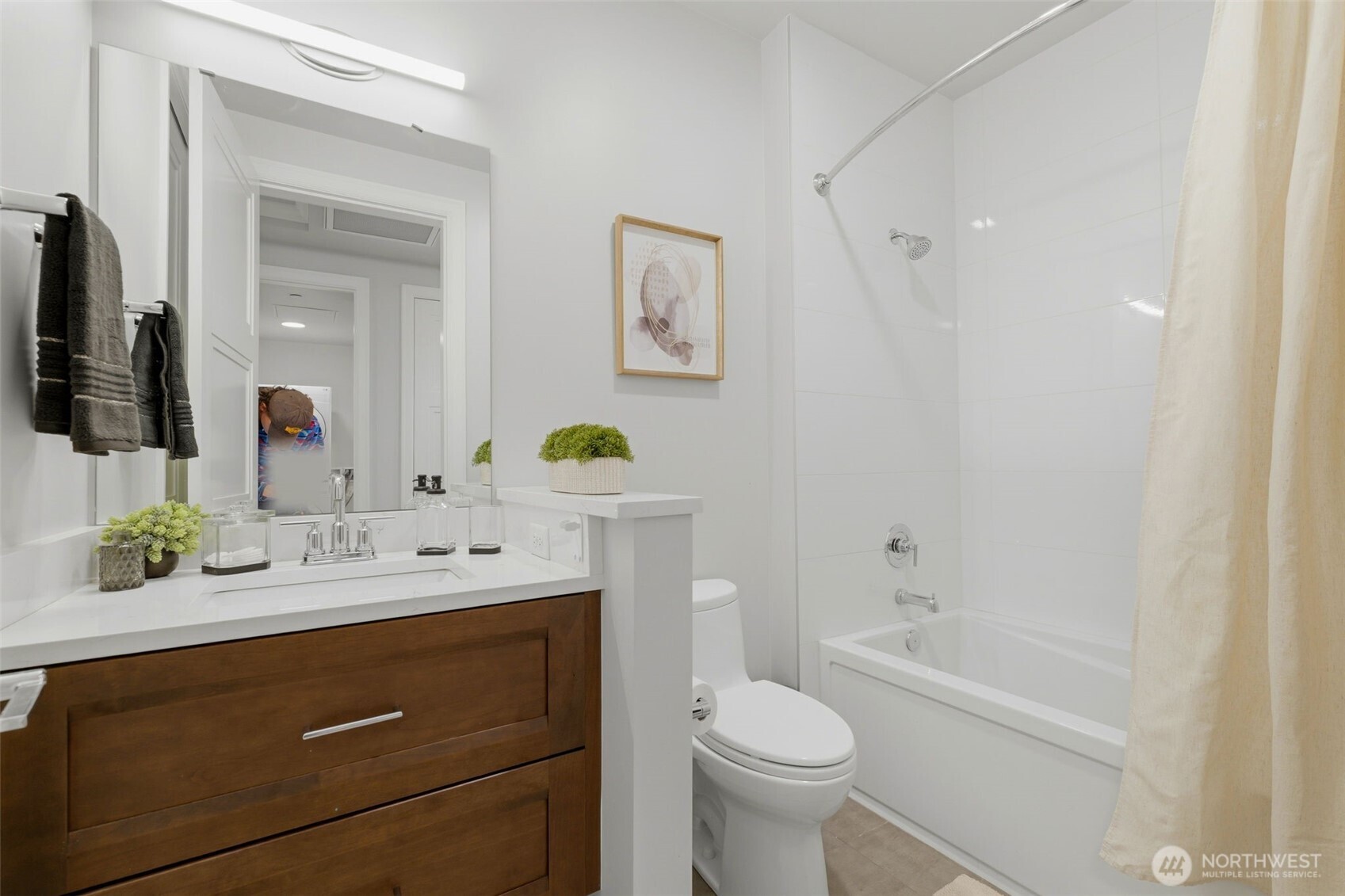 4907 Main Street, Unit 214 Tacoma, WA 98407 - Photo 18 of 34 a bathroom with a sink a toilet and shower