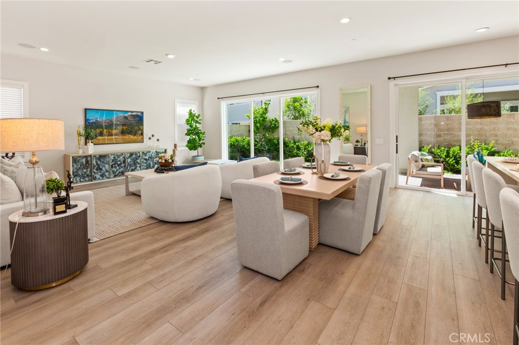 181 Mulberry Lake Forest, CA 92630 - Photo 12 of 46 a living room with furniture and a large window