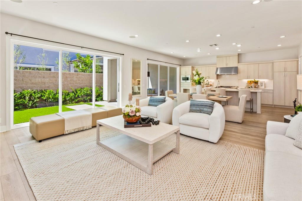 181 Mulberry Lake Forest, CA 92630 - Photo 15 of 46 a living room with furniture and a large window