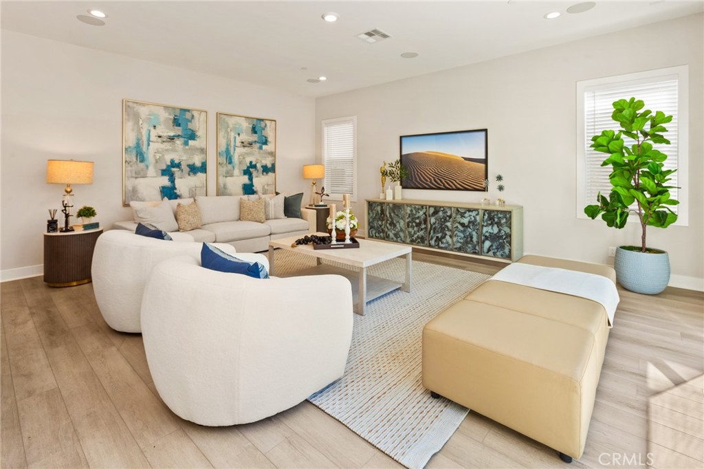 181 Mulberry Lake Forest, CA 92630 - Photo 18 of 46 a living room with furniture and a flat screen tv
