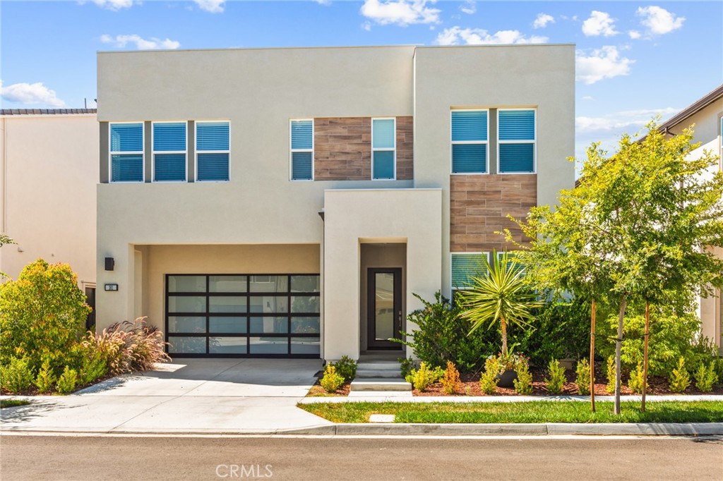 181 Mulberry Lake Forest, CA 92630 - Photo 2 of 46 a front view of a house with a yard