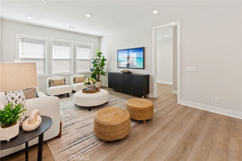 181 Mulberry Lake Forest, CA 92630 - Photo 21 of 46 a living room with furniture and wooden floor