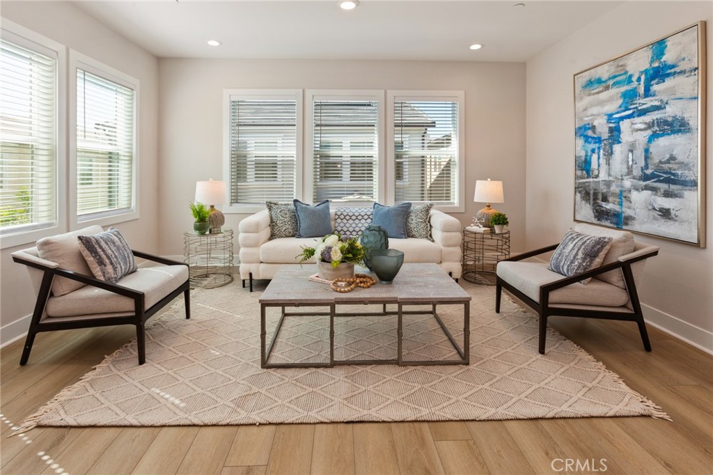 181 Mulberry Lake Forest, CA 92630 - Photo 25 of 46 a living room with furniture and a large window