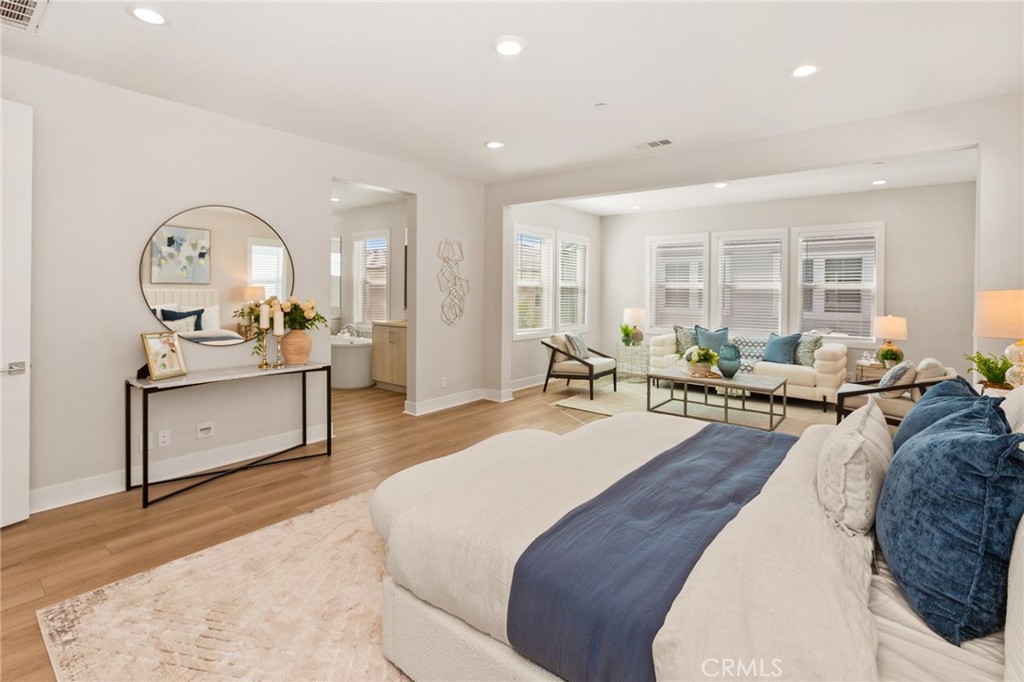 181 Mulberry Lake Forest, CA 92630 - Photo 26 of 46 a living room with furniture a table and large windows