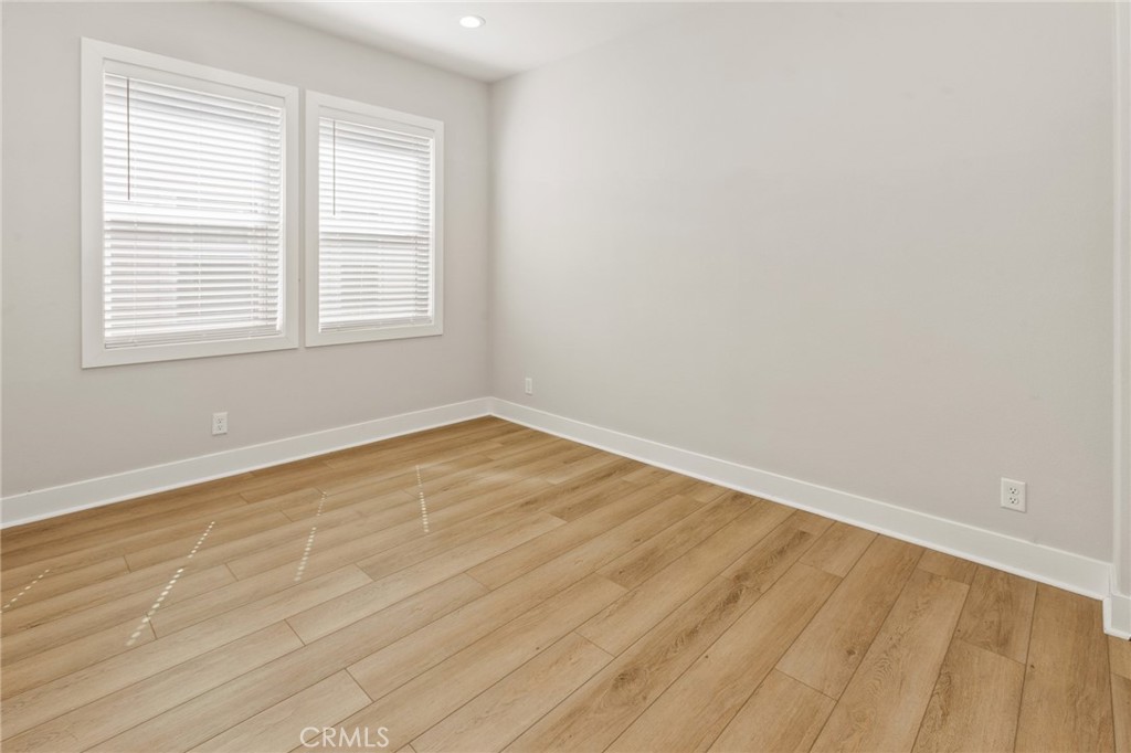 181 Mulberry Lake Forest, CA 92630 - Photo 33 of 46 wooden floor in an empty room with a window
