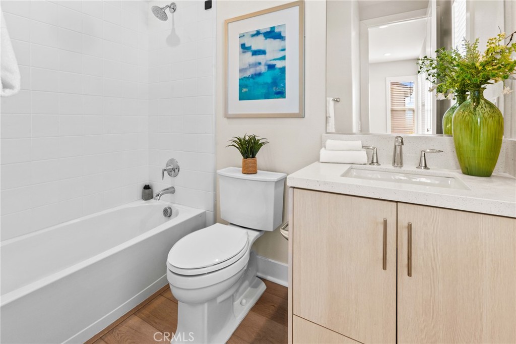 181 Mulberry Lake Forest, CA 92630 - Photo 41 of 46 a bathroom with a granite countertop toilet sink and bathtub