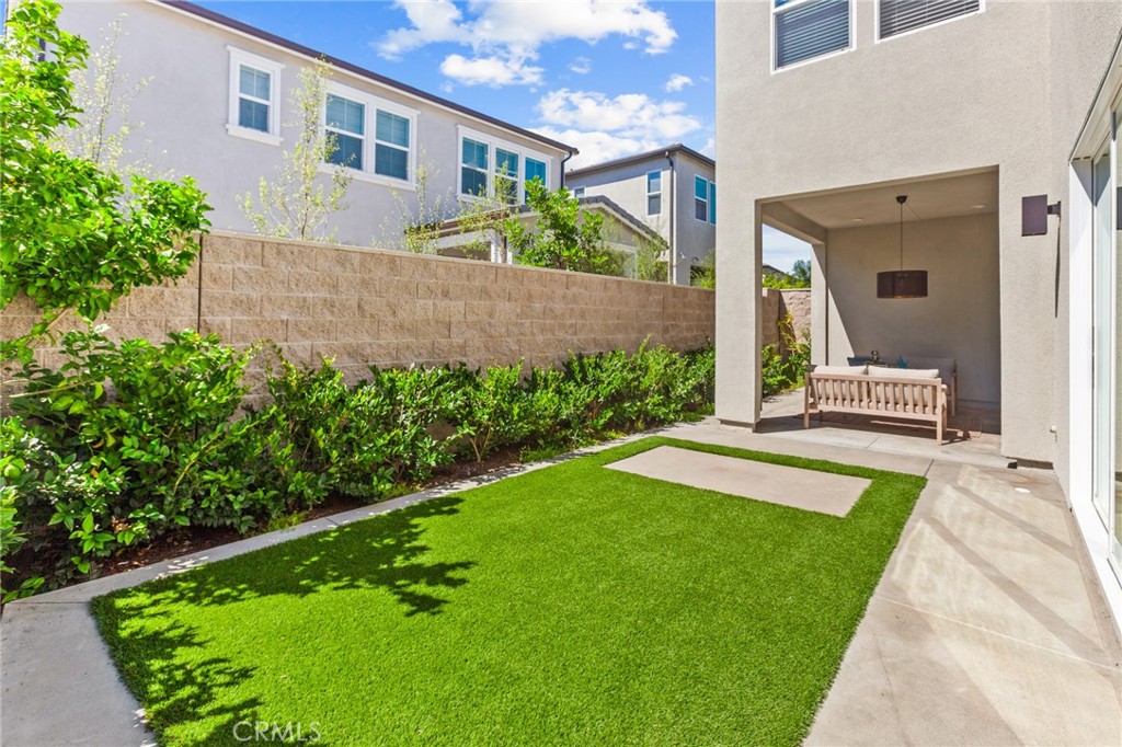 181 Mulberry Lake Forest, CA 92630 - Photo 45 of 46 a front view of a house with garden