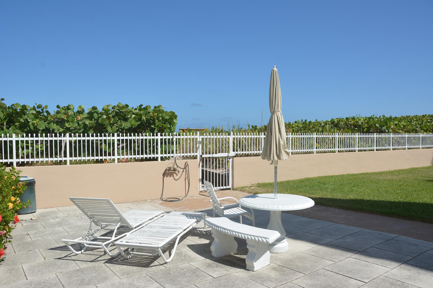 3600 North Ocean Drive, Unit 110 Riviera Beach, FL 33404 - Photo 50 of 51 SUNNING AREA NEAR OCEAN