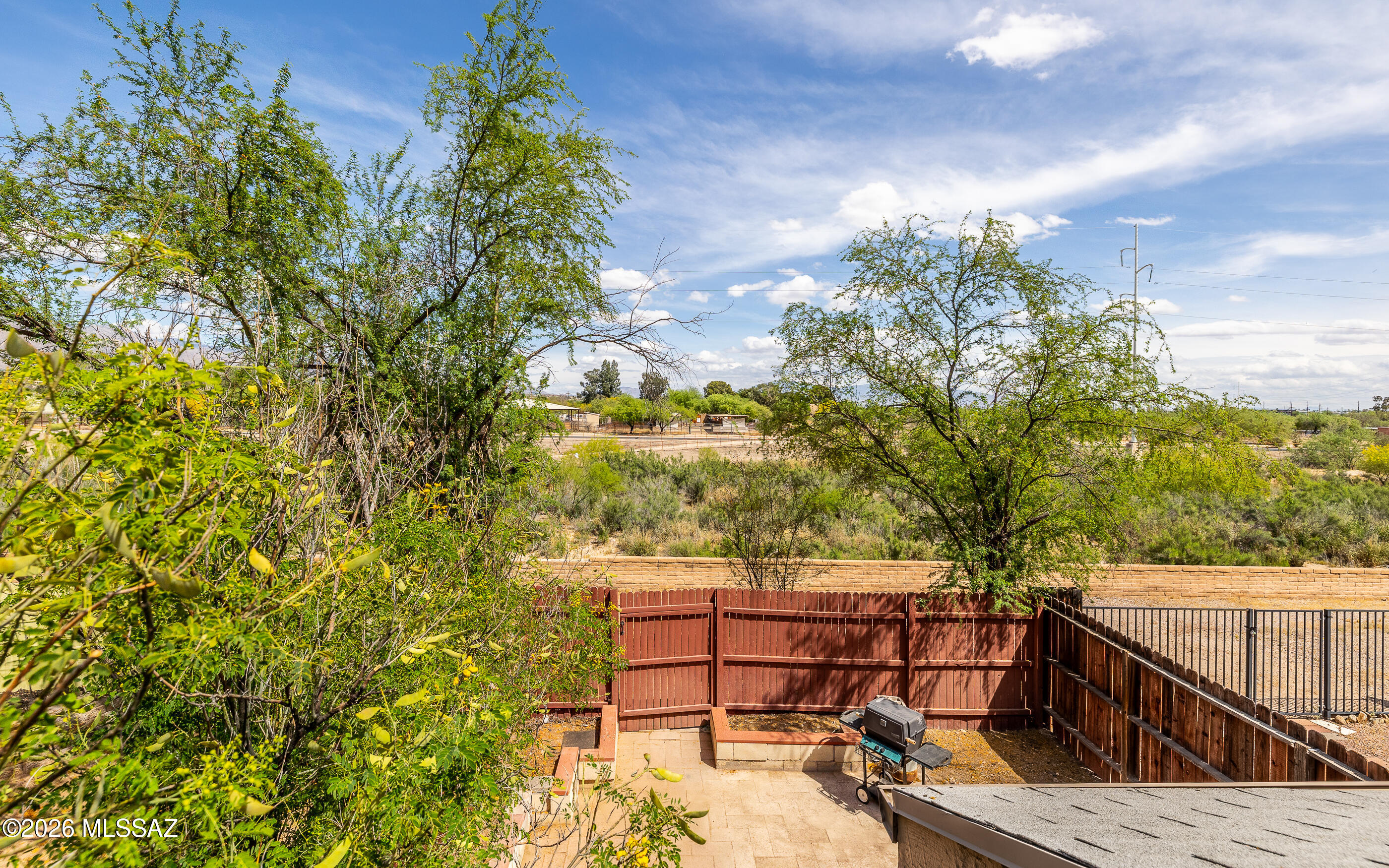 3750 North Country Club Road, Unit 46 Tucson, AZ 85716 - Photo 24 of 34 a view of a balcony with chairs