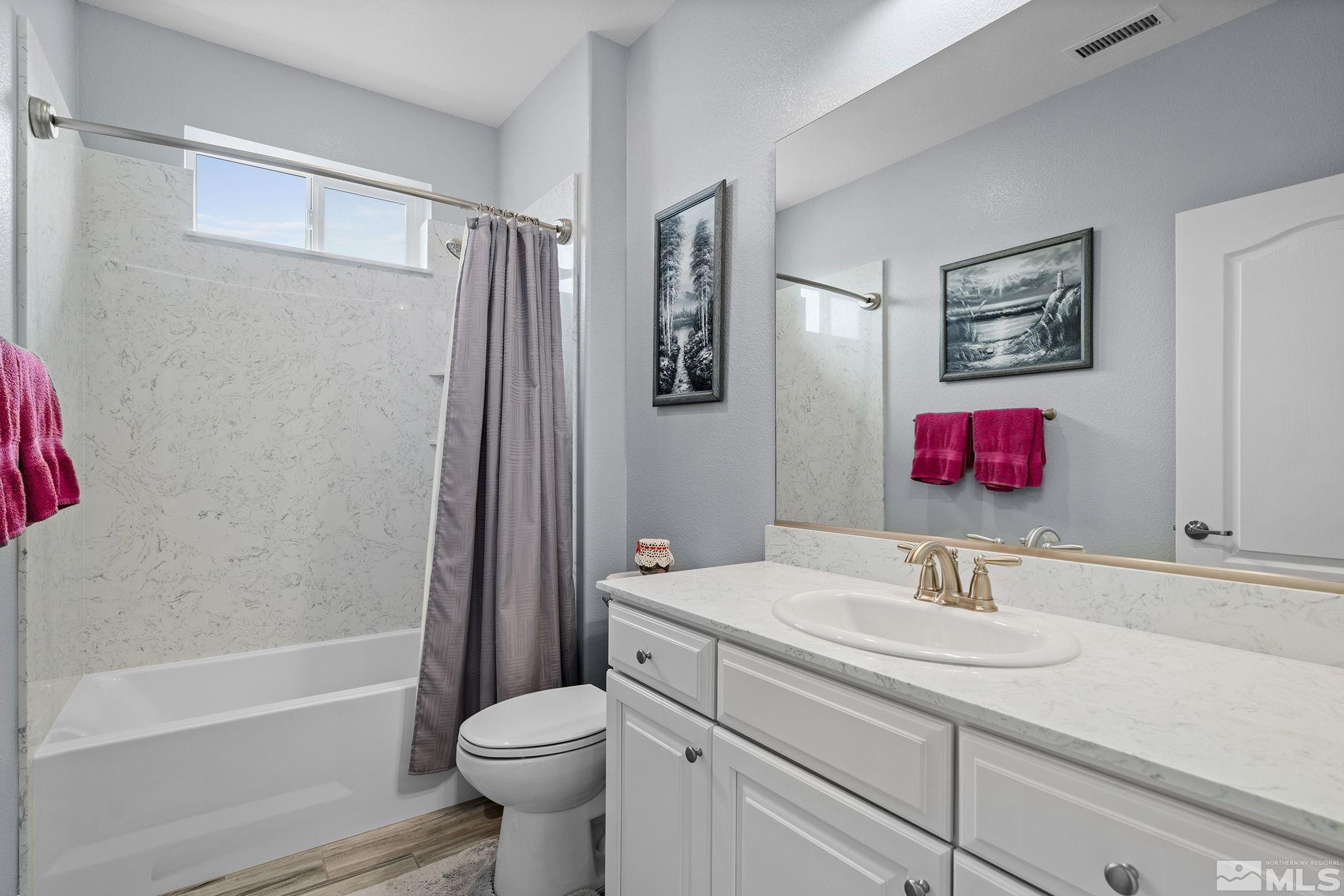 2811 McCauley Ranch Boulevard Reno, NV 89521 - Photo 23 of 40 a bathroom with a sink toilet and shower