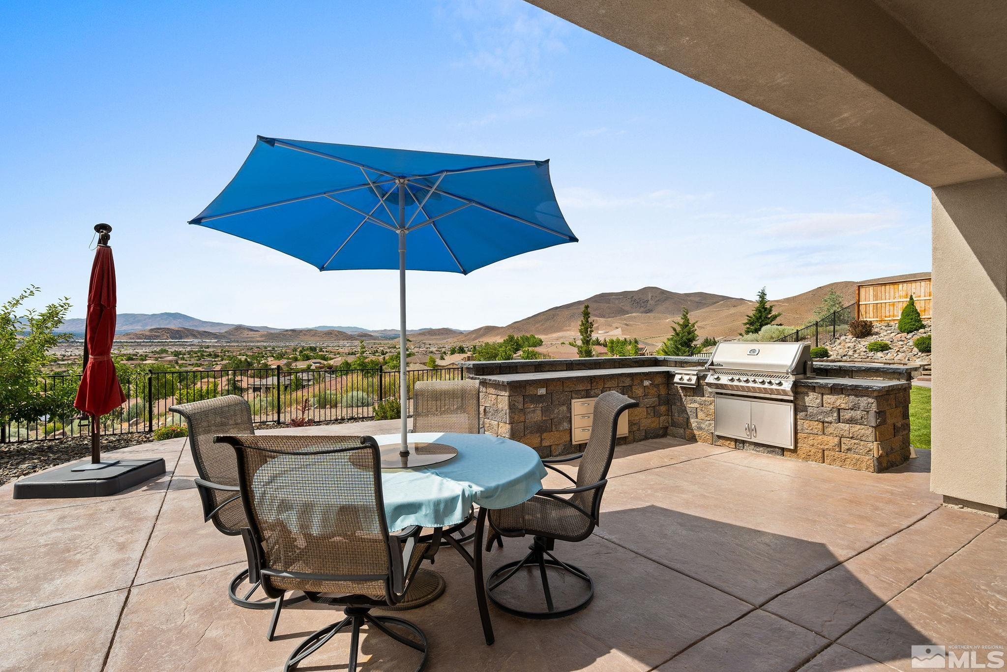 2811 McCauley Ranch Boulevard Reno, NV 89521 - Photo 31 of 40 a view of a terrace with furniture and stove