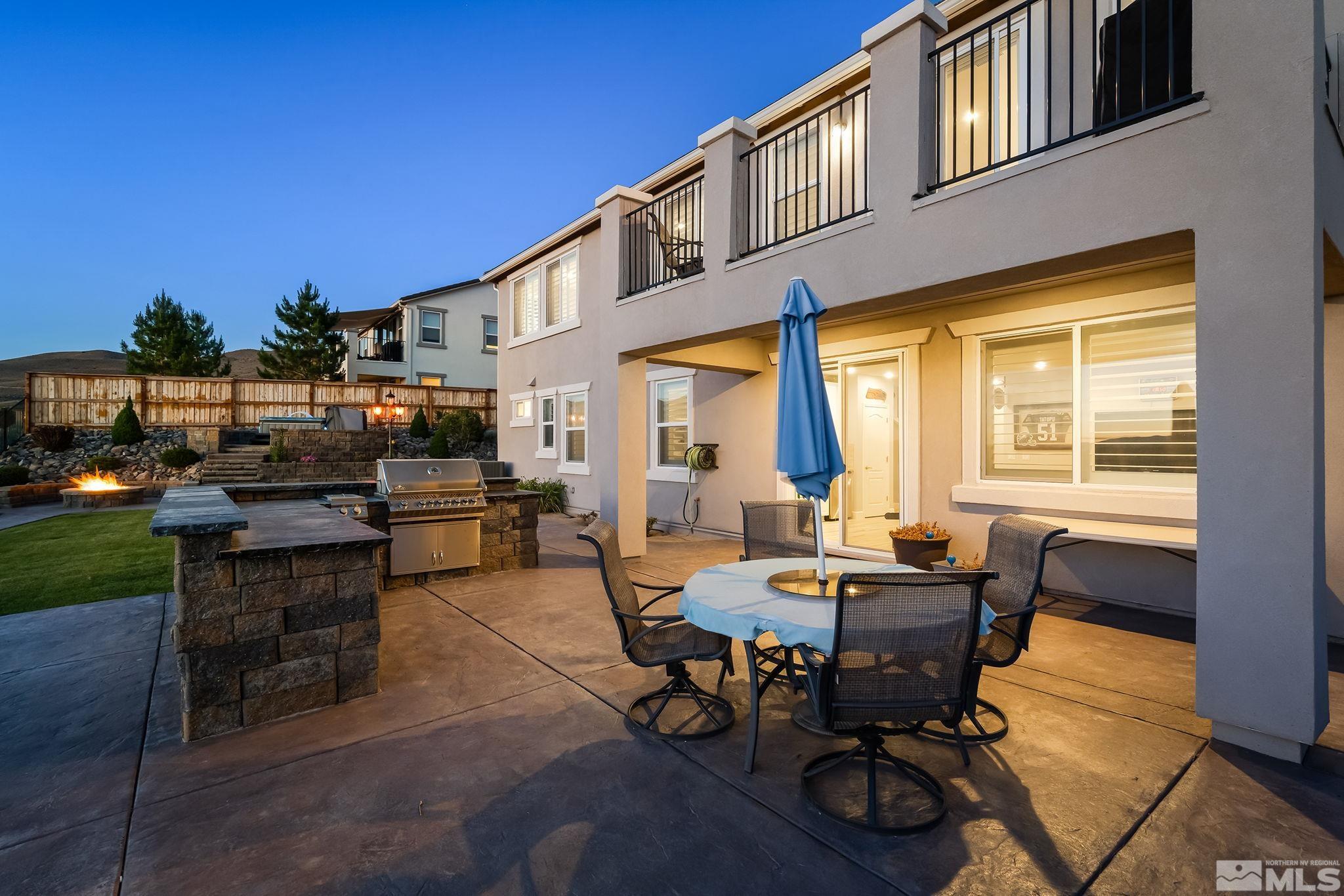 2811 McCauley Ranch Boulevard Reno, NV 89521 - Photo 33 of 40 a view of a dinning tables and chairs in the patio