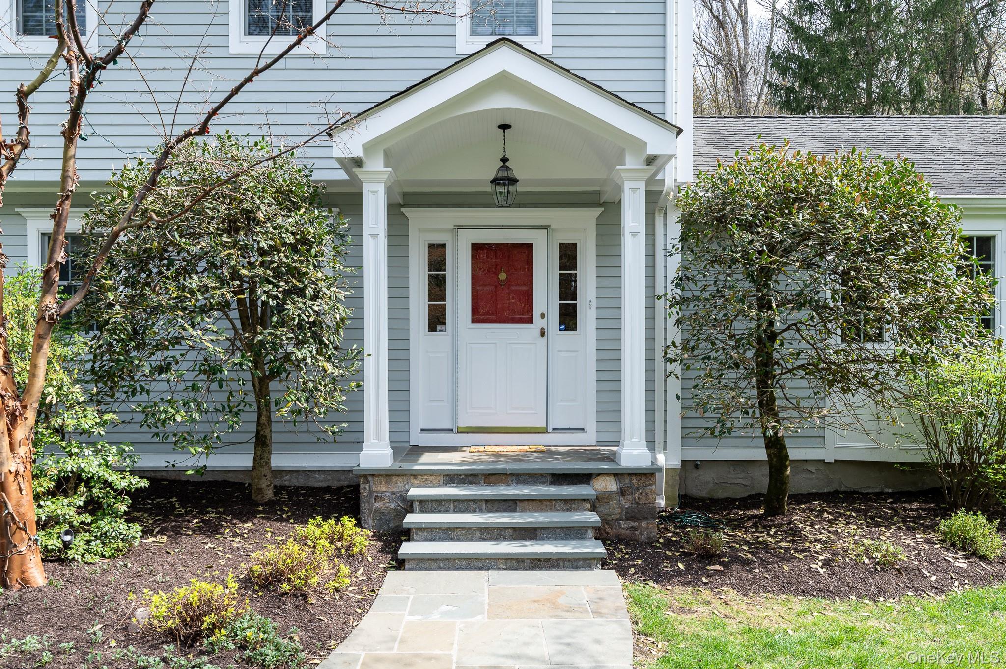 32 Watch Hill Road Croton-on-Hudson, NY 10520 - Photo 2 of 43 a front view of a house with a yard