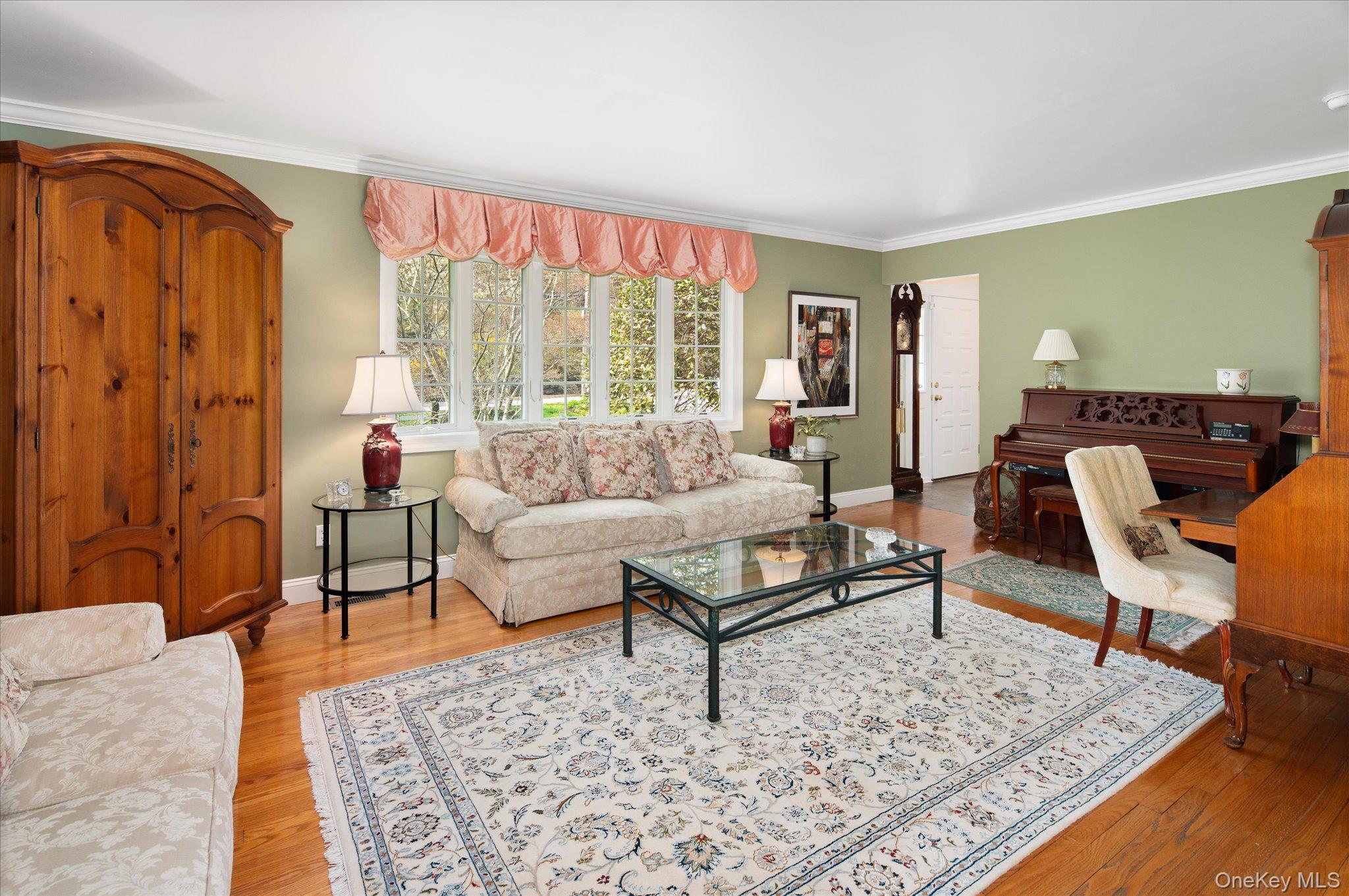 32 Watch Hill Road Croton-on-Hudson, NY 10520 - Photo 10 of 43 a living room with furniture and a rug