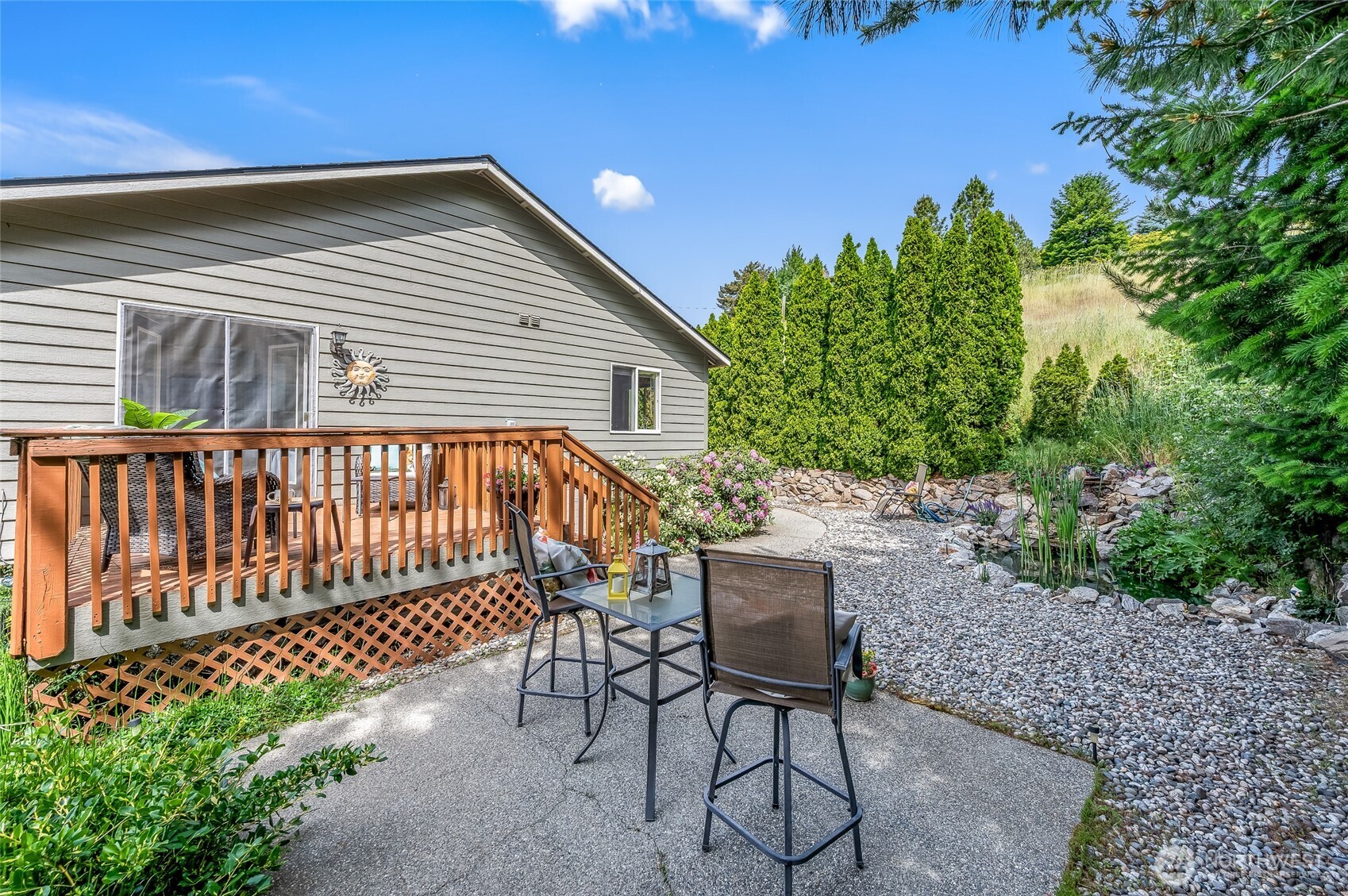 316 Easy Street Wenatchee, WA 98801 - Photo 19 of 39 a view of backyard with deck and outdoor seating