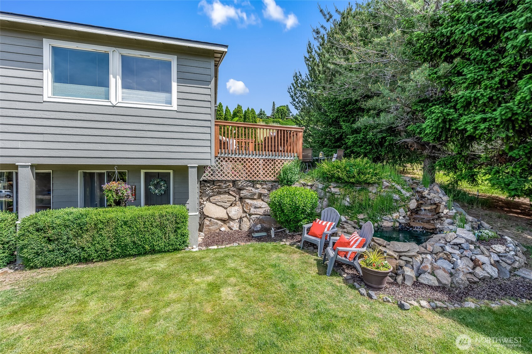 316 Easy Street Wenatchee, WA 98801 - Photo 23 of 39 a view of a house with a yard and sitting area