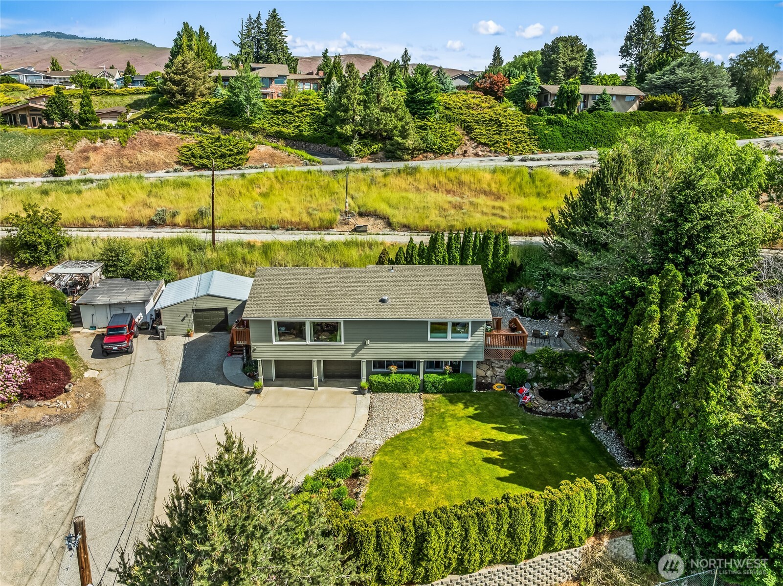 316 Easy Street Wenatchee, WA 98801 - Photo 32 of 39 an aerial view of a house with swimming pool and outdoor seating