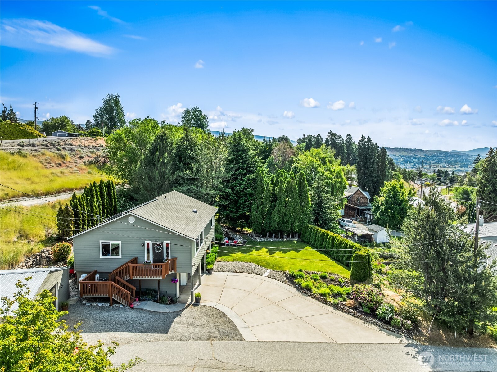 316 Easy Street Wenatchee, WA 98801 - Photo 36 of 39 a aerial view of a house with swimming pool garden and patio