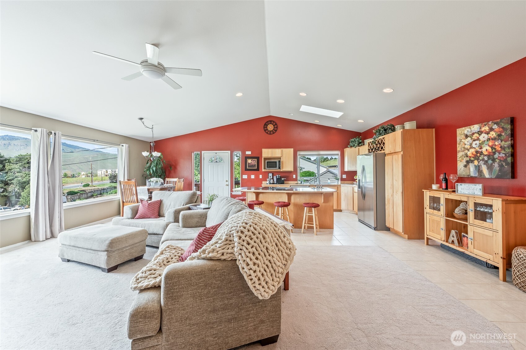 316 Easy Street Wenatchee, WA 98801 - Photo 5 of 39 a living room with furniture a fireplace and a large window