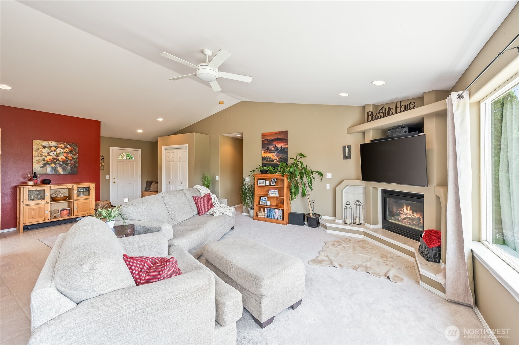 316 Easy Street Wenatchee, WA 98801 - Photo 8 of 39 a living room with furniture and a flat screen tv