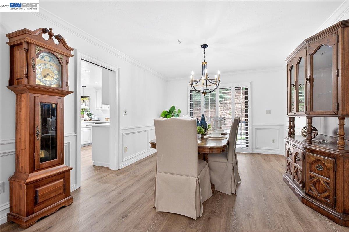 28 Harrington Road Moraga, CA 94556 - Photo 16 of 44 a view of a dining room with furniture window and wooden floor