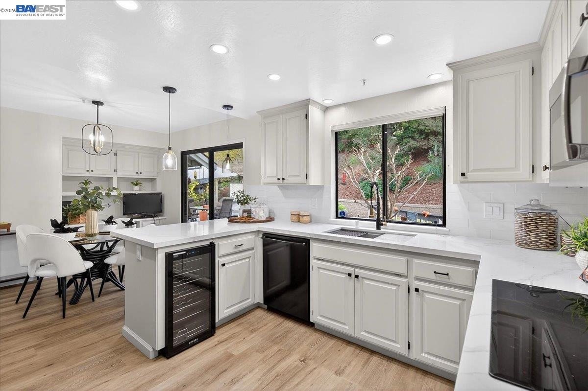 28 Harrington Road Moraga, CA 94556 - Photo 20 of 44 a kitchen with white cabinets and white appliances