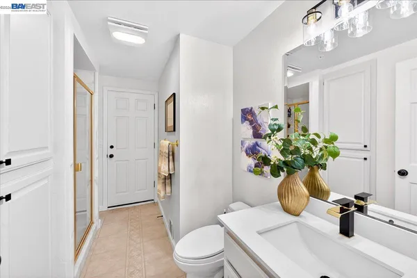 a view of bathroom with a sink toilet and shower