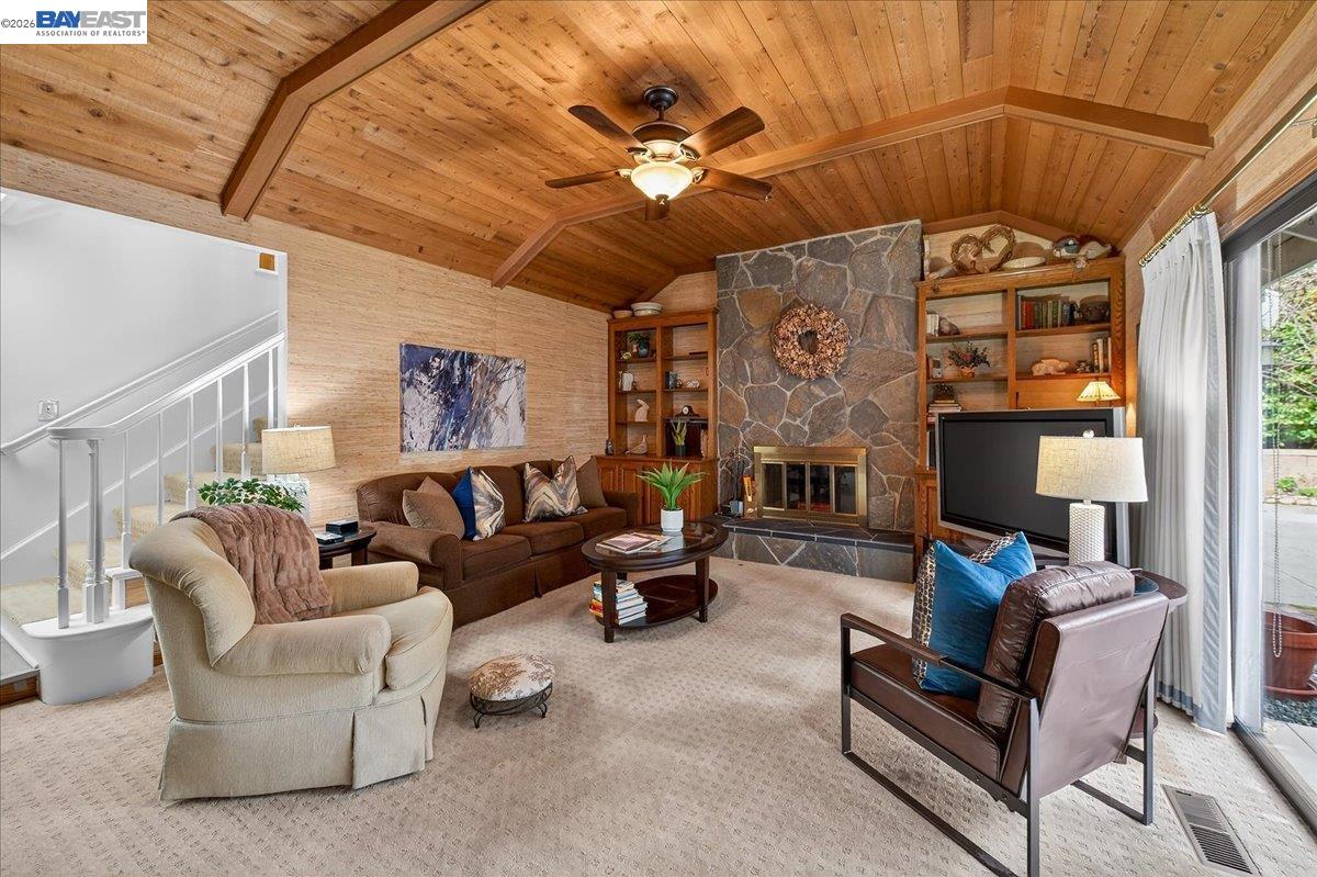 28 Harrington Road Moraga, CA 94556 - Photo 25 of 44 a living room with furniture and a fireplace