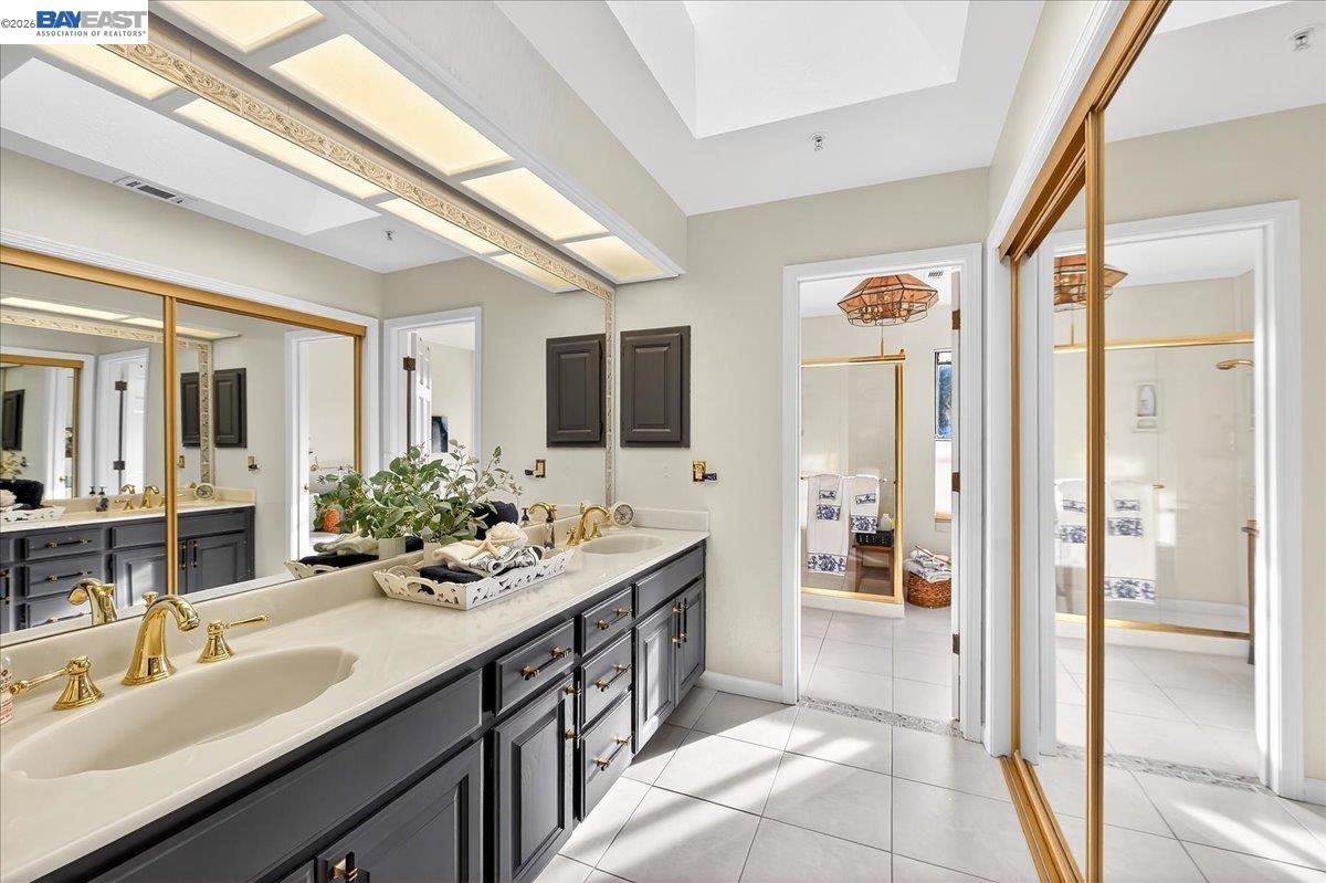 28 Harrington Road Moraga, CA 94556 - Photo 33 of 44 a spacious bathroom with a double vanity sink shower and mirror