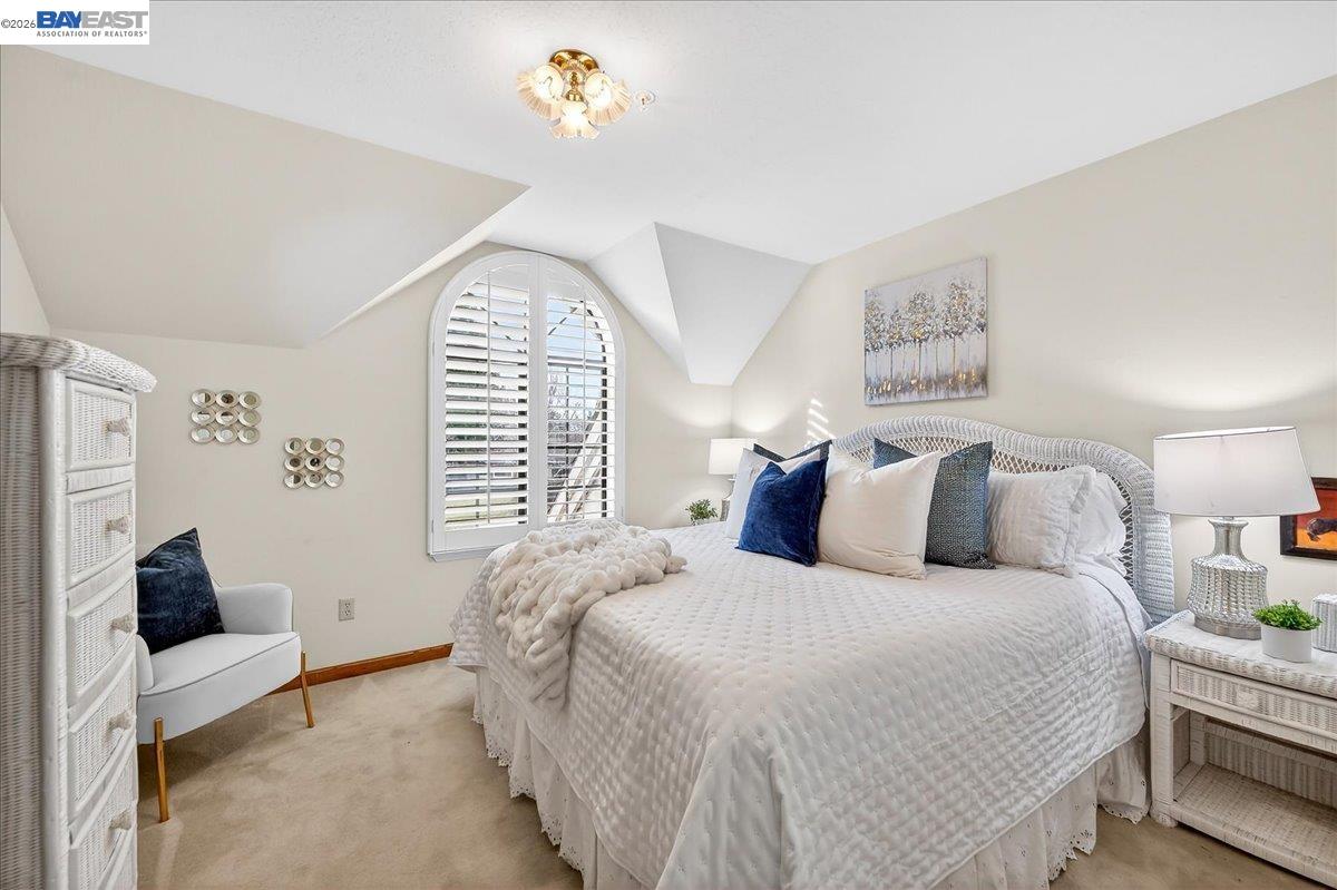 28 Harrington Road Moraga, CA 94556 - Photo 36 of 44 a spacious bedroom with a bed and a window