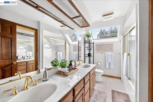 a lobby with furniture and large windows