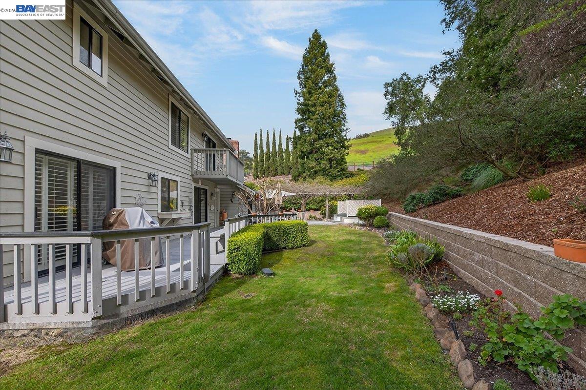 28 Harrington Road Moraga, CA 94556 - Photo 39 of 44 a view of a house with wooden deck and a yard