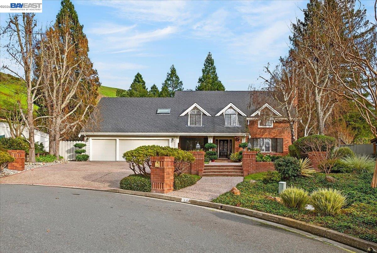 28 Harrington Road Moraga, CA 94556 - Photo 4 of 44 an aerial view of a house with a yard and street view