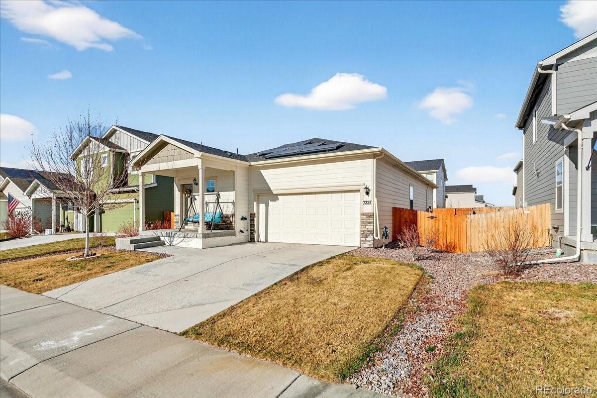 7227 Vermillion Street Frederick, CO 80530 - Photo 2 of 28 a view of a house with basketball court