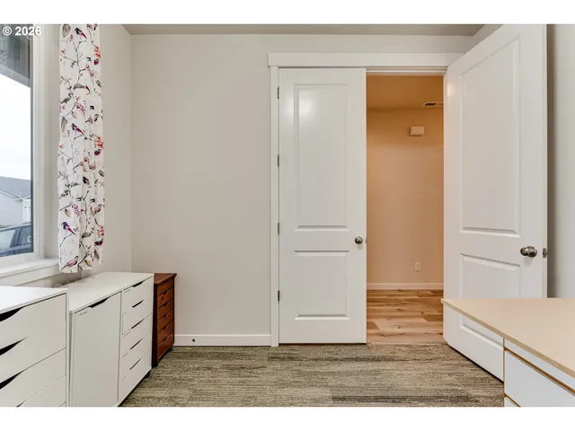 a bathroom with a sink a mirror and a shower