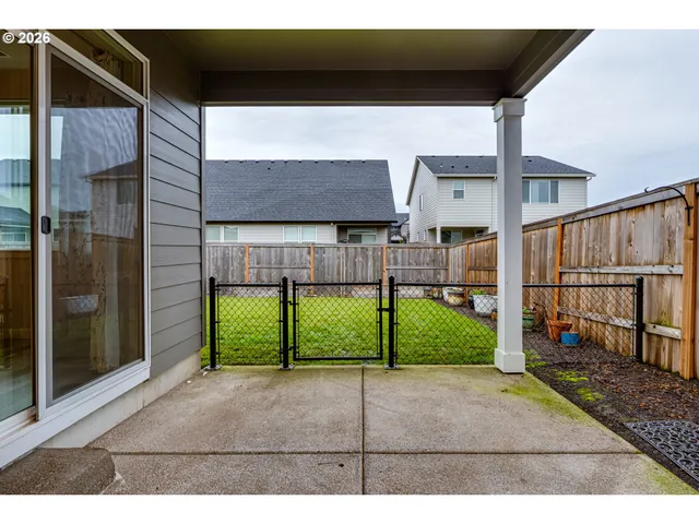 a view of a brick house front of a house