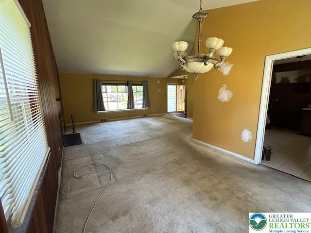 2065 Hopewell Road Bethlehem, PA 18017 - Photo 3 of 19 A versatile living area with a classic chandelier awaits your personalized touches.