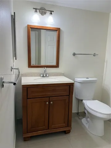 a bathroom with a shower and toilet